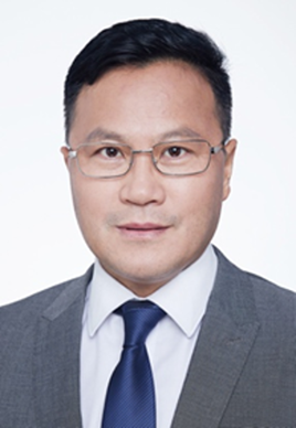 A person in a suit and tie

Description automatically generated